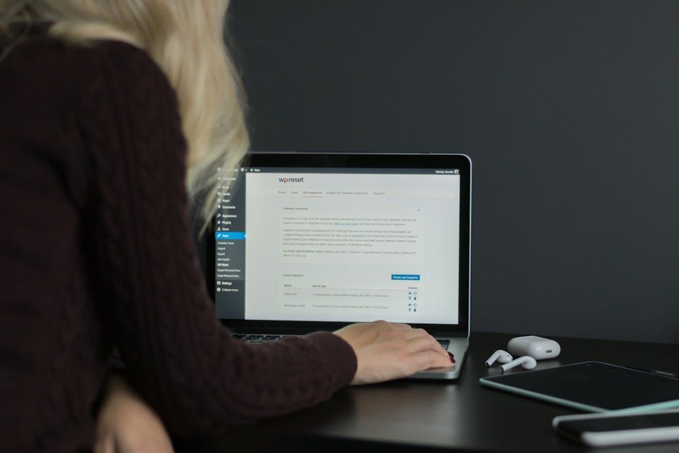 Person working on a website on a laptop